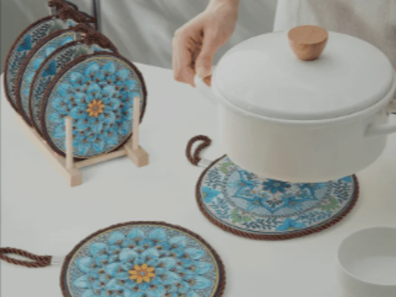 A trivet is a small, heat-resistant object used to protect surfaces from heat damage.