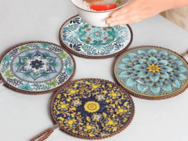 A trivet is a small, heat-resistant object used to protect surfaces from heat damage.