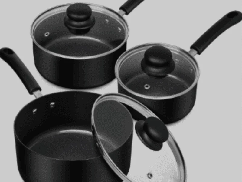 Sauce Pan set with black non-stick coating, glass lids, and ergonomic handles.