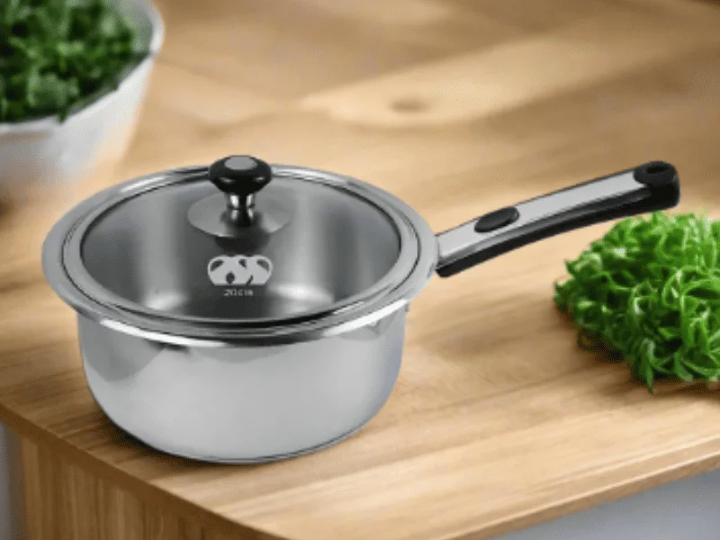 Sauce Pan set with grey non-stick coating, glass lids, and ergonomic handles.